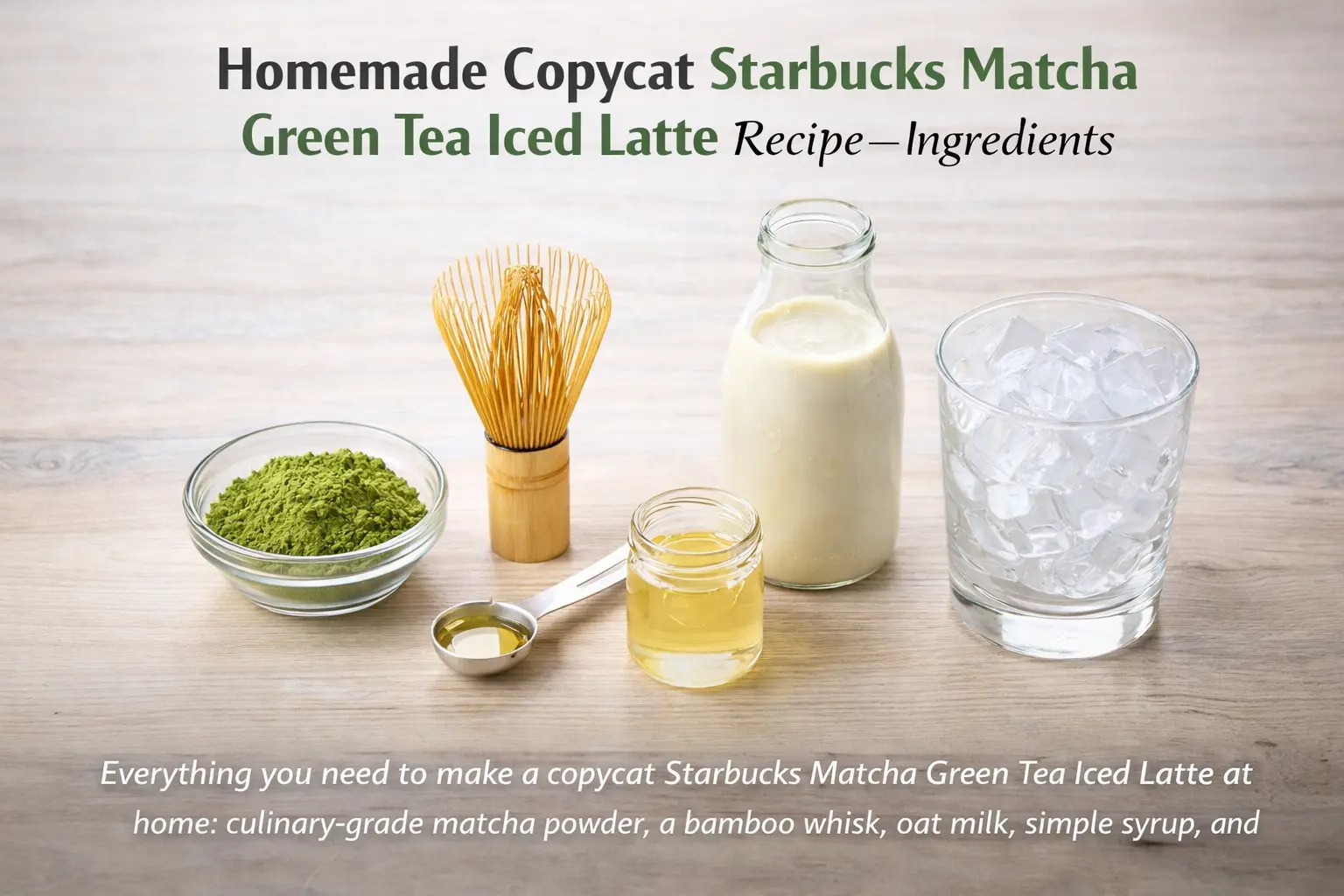 Flat lay of homemade matcha latte ingredients including matcha powder, bamboo whisk, oat milk, simple syrup, and ice on a wood surface